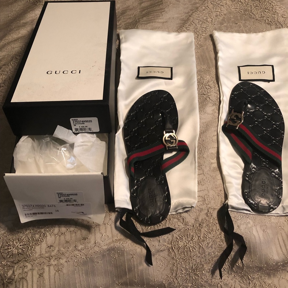 Gucci / Nero/ flip flops